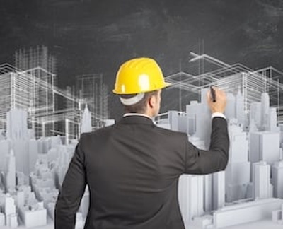 Design-build development contracts alleviate the need for a business owner to have separate agreements with an architect and general contractor.